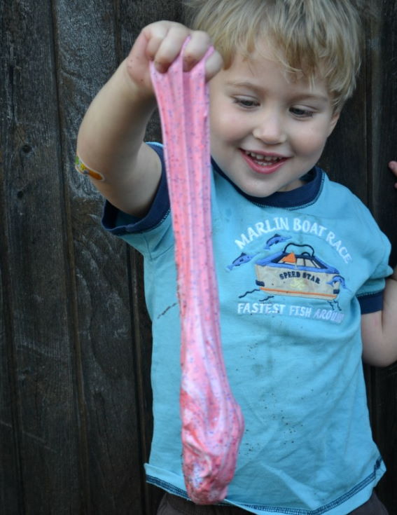 little boy holding Patriotic Slime