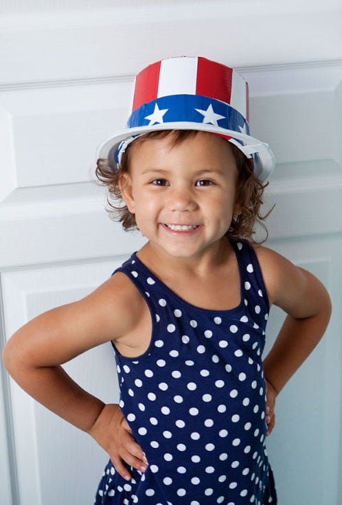 little girl smiling wearing DIY DUCT TAPE UNCLE SAM HAT