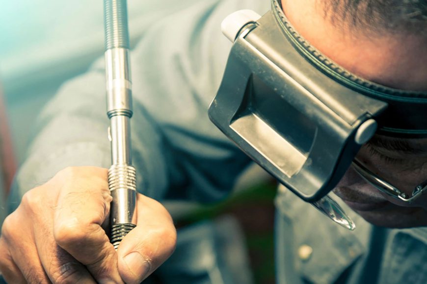 Man using Headband Magnifier