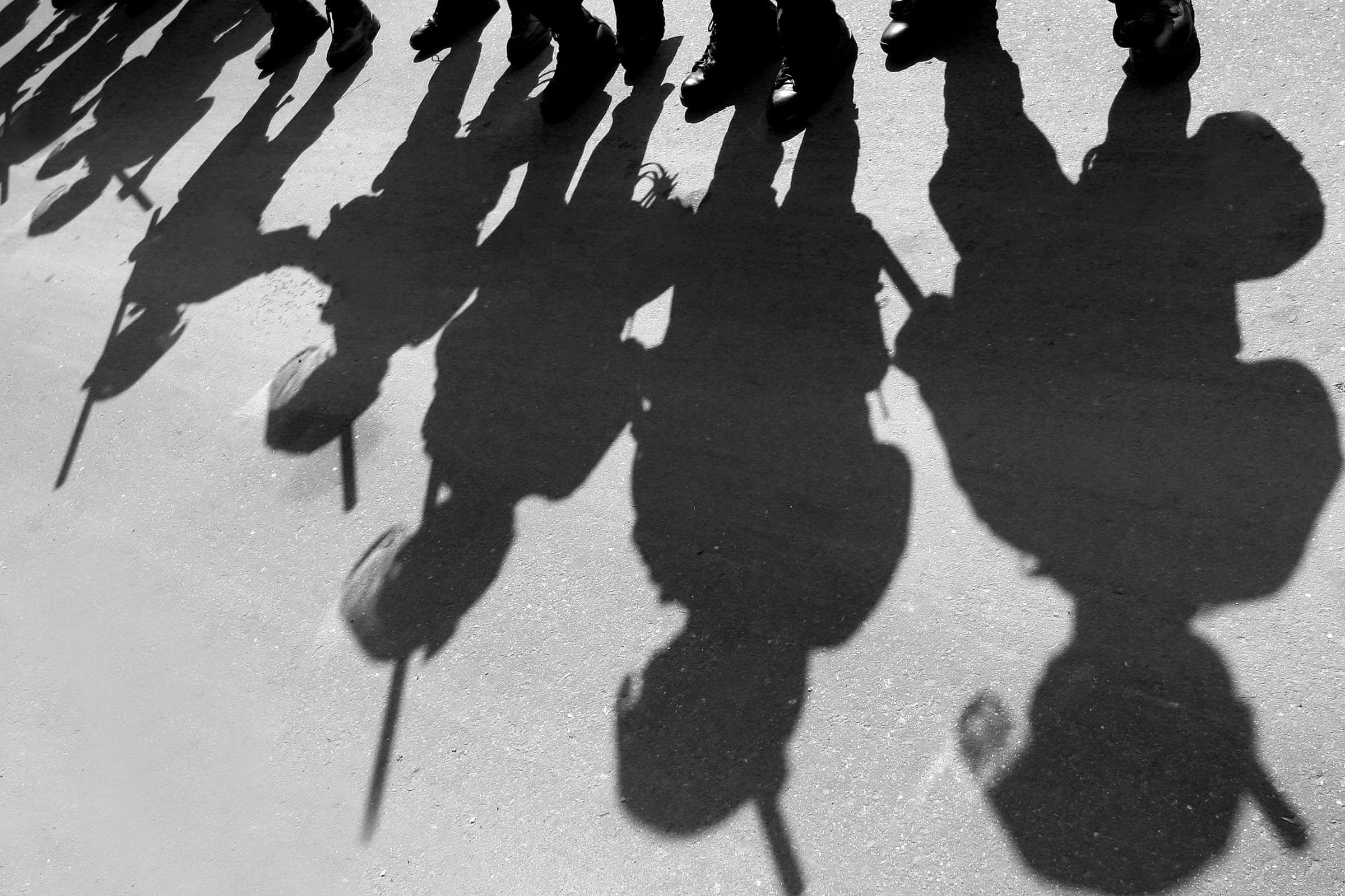 Shadows of people on the street