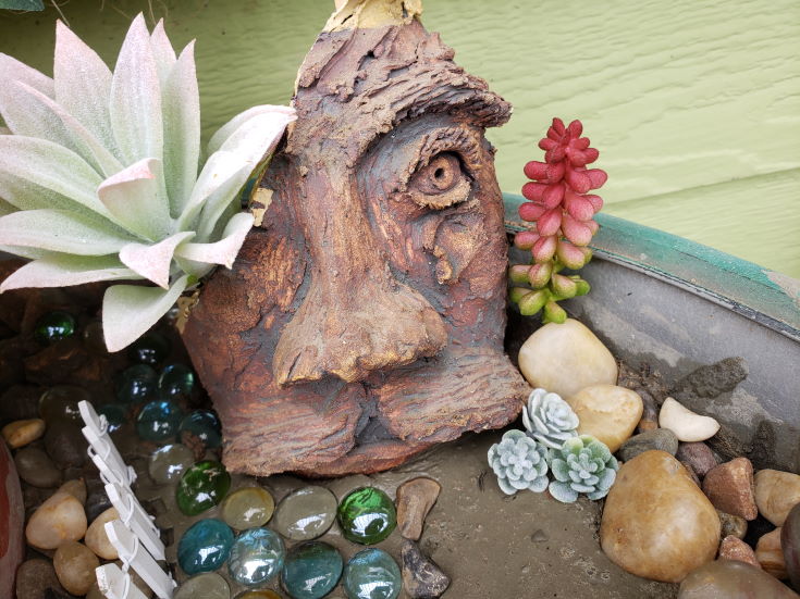 Fairy Garden, wooden carved image, colorful stones, flower