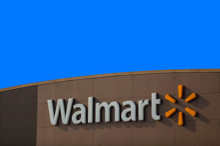 Photo of a walmart store sign logo on deep blue sky