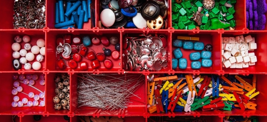 Red Craft Storage with craft materials on it