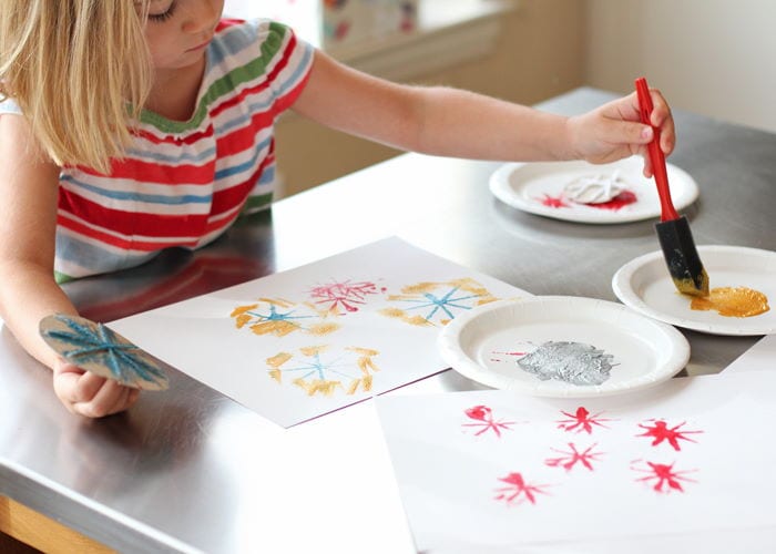 little girl making Fireworks Craft for the Fourth of July