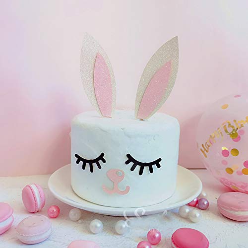 Cute bunny rabbit cake topper with a couple of food-safe bamboo sticks and some pink and white glitter cardstock