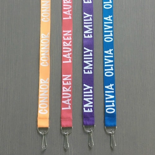 Heat transfer vinyl htv lanyards in different colors in a gray background.