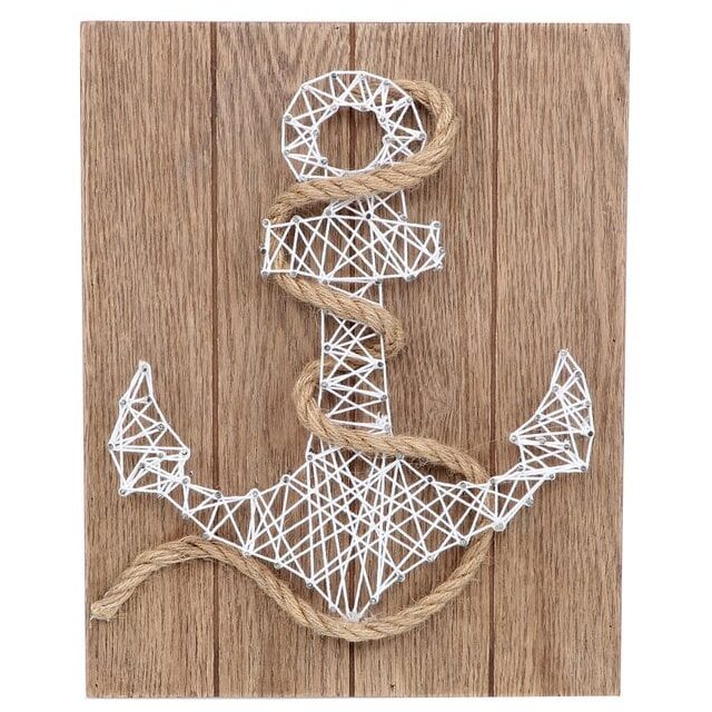Anchors Away string art on a wooden background.