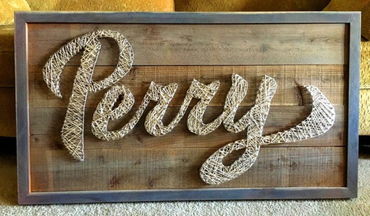 Personalized name using string art ideas on barn wood.