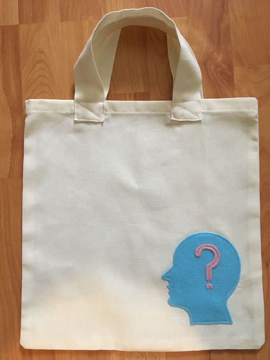 A simple beginner's bag with a blue head question mark design at the lower right portion of the bag