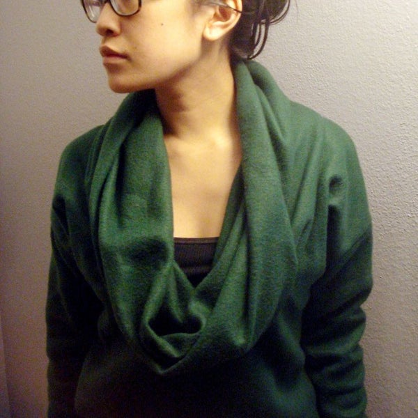 Green Cowl-Neck Sweater From Fleece Blanket wore by a woman with eyeglass