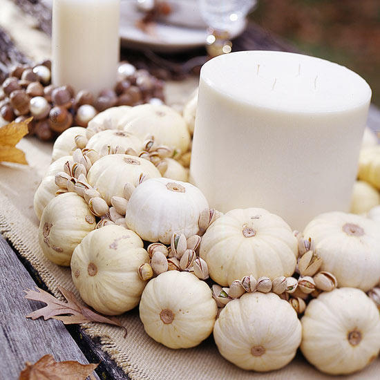 Cream colored pumpkin wreath with candle and pistachios thanksgiving centerpieces