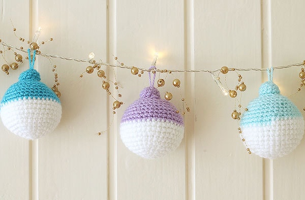 Crochet Christmas ball ornaments in pastel colors