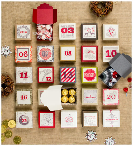 DIY boxes filled with chocolates and candies in brown cloth background