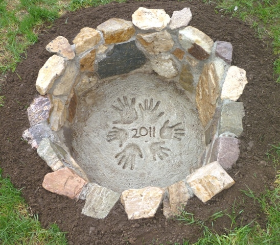 Stone Fire Pit with hand print and year