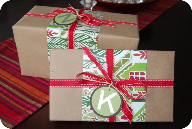 Monogrammed Christmas Gift Wrapper with red ribbon and letter tag