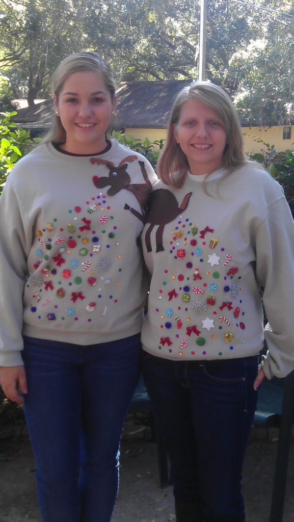 Couple Christmas sweater with sequins and reindeer