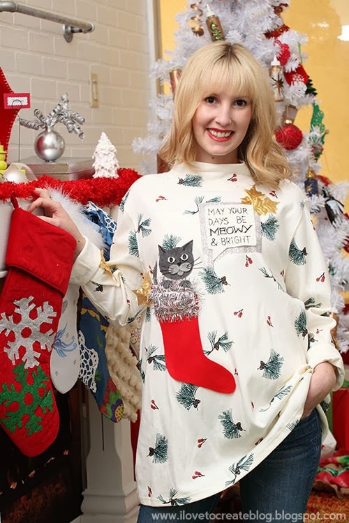 Christmas sweater with cat on a red sock