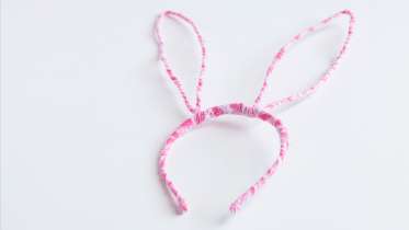 Bunny ears made from craft wire and strips of pink fabric.