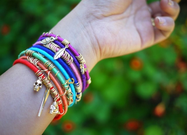 a close up shot of a woman's wrist wearing a DIY Wrap Bangles