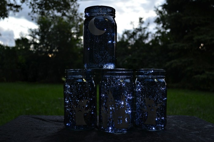 Beautiful jar luminaries using black mercury glass with battery-powered LED lights to illuminate.