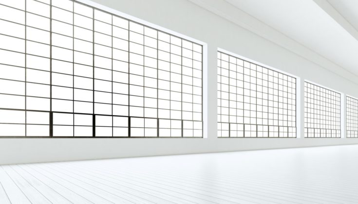 Empty modern industrial room with huge panoramic windows,painted white wood floor,blank walls.3D rendering.Generic design interior contemporary building.Open space business conference hall.Horizontal