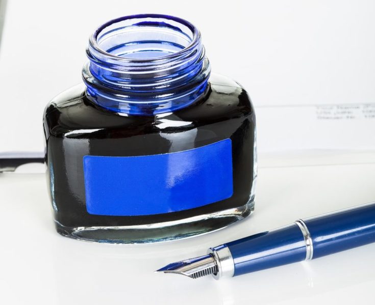 Photos of ink bottle and fountain pen