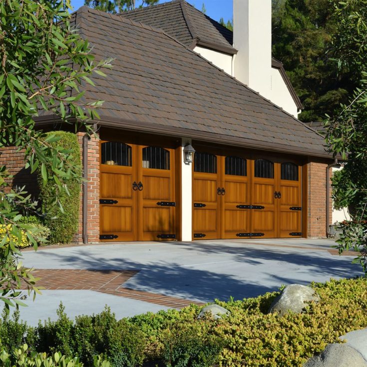 ECO-Friendly Composite Garage Doors in a Custom European Style for a Tudor Home