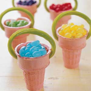 Suga ice cream cones filled with jelly beans and green licorice sticks for a handle.