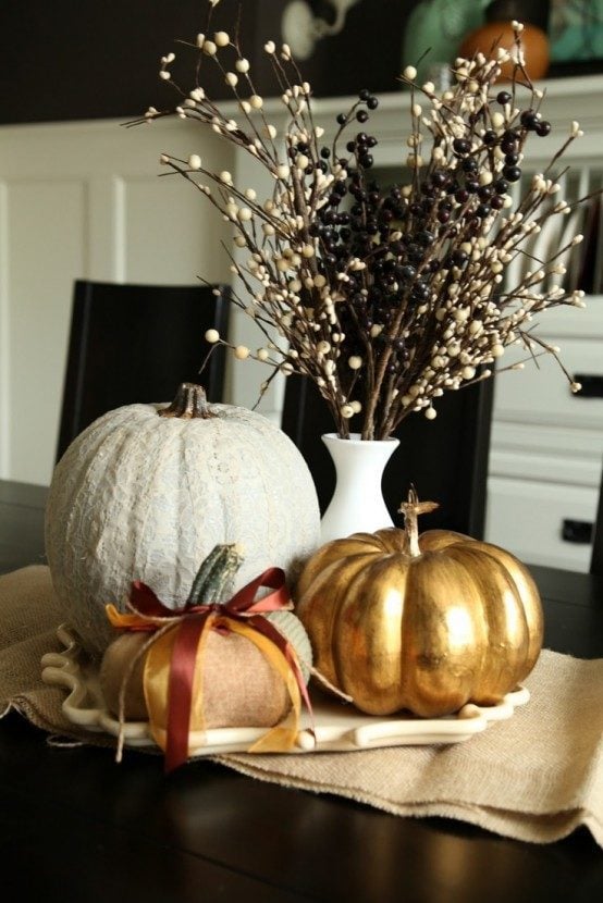 Elegant black, white and gold pumpkin centerpieces