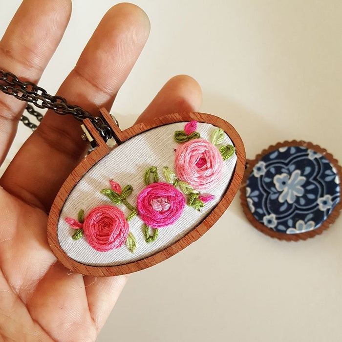 Hand holding the Embroidery Hoop Jewelry