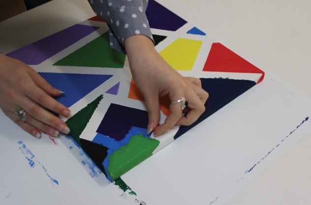 a woman making Fun Canvas Art for Kids