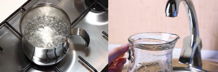 Stainless jug filled with boiling water and a glass jug ready to be filled with tap water on the faucet.