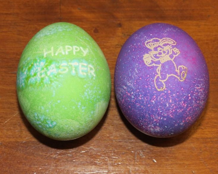 Laser Engraved Easter Eggs, green and purple on the table