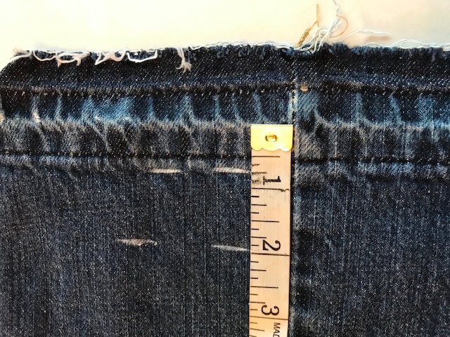 jeans tip bottom with tape measure