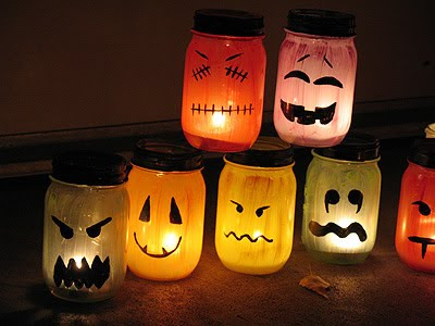 Jar luminaries with different designs,lighted with tea candle.