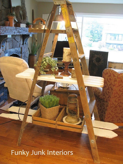 Funky Junk Interiors picket fence as shelves for an A frame ladder