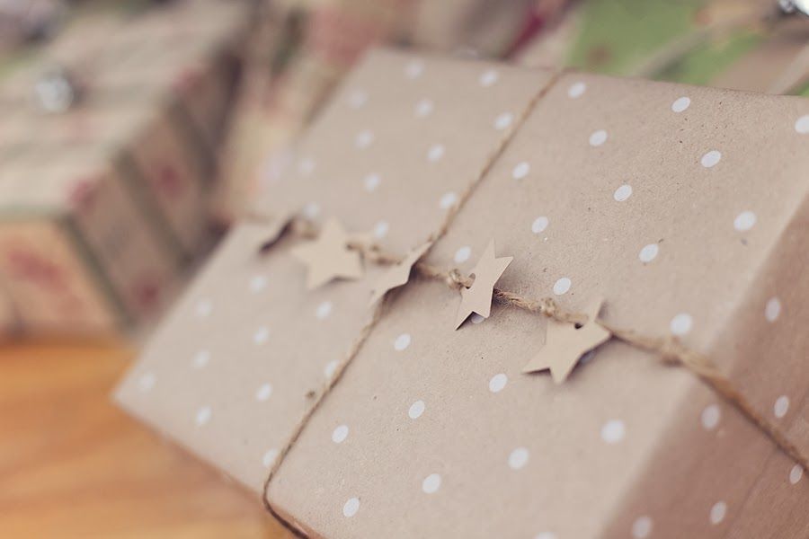 Brown wrapping paper with white polka dots with stars on a jute