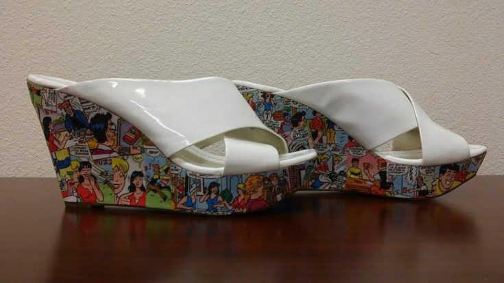 a pair of shoes with decoupage
