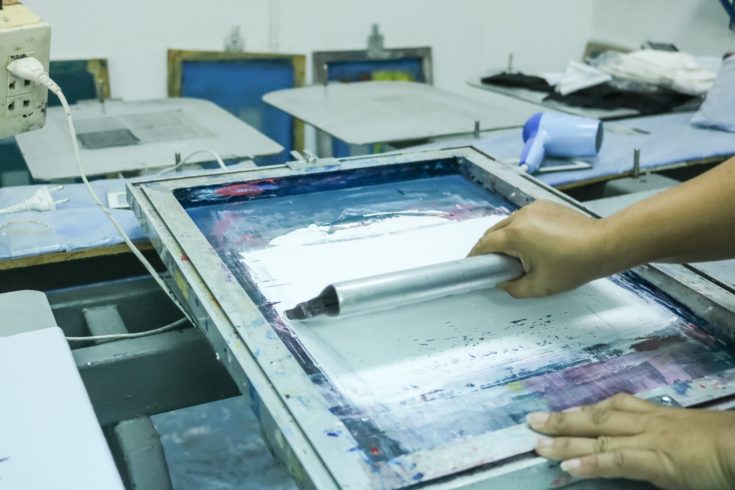 Man use screen for printing