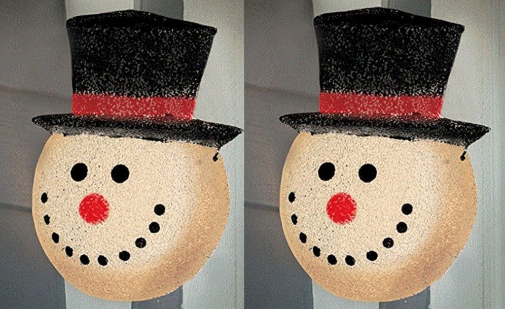 Two snowmen wearing black tall hat ball ornaments