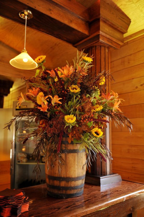 Flowers in a barrel country chic centerpiece