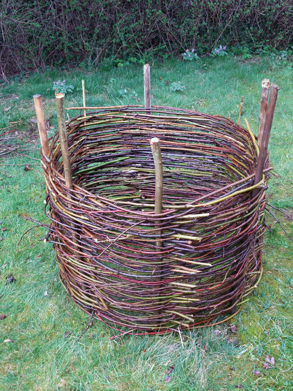 Colorful sticks weaved garden bed