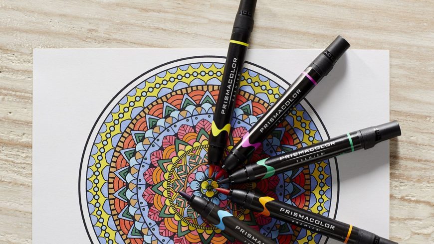 Beautiful Art with mandala markers in wooden background