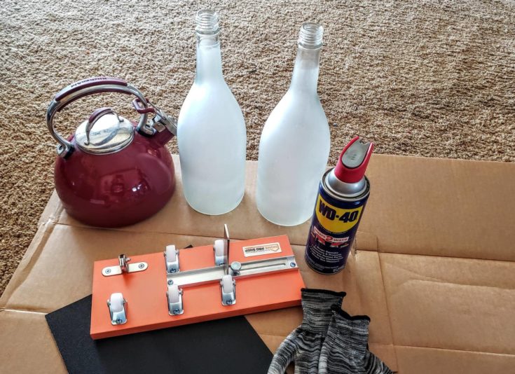 Wine Bottle + Kettle for hotwater + Pair of Gloves + Lubricant Oil + Bottle Cutter Frame + Sand Paper