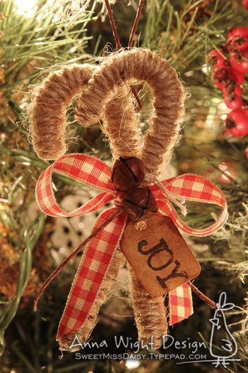 Anna Wight jute candy cane with red plaid ribbon and joy tag