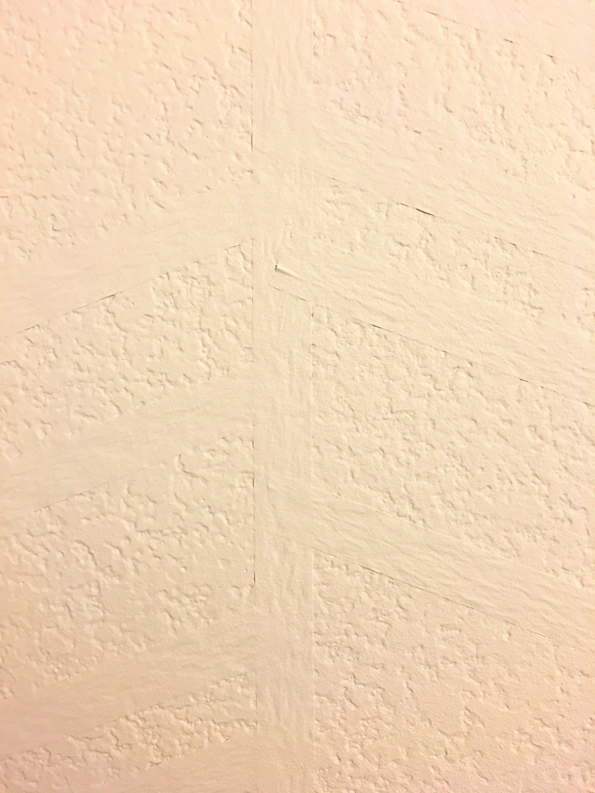 how to paint a herringbone accent wall